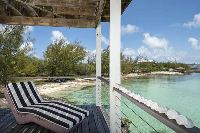 Villa's lower level deck and our small secluded beach.