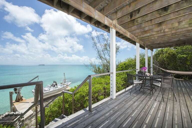 Lower level deck with steps to the sea.