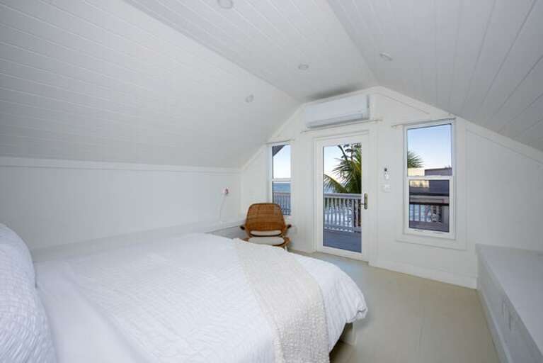 Third bedroom has a king bed, an en-suite full bath, and three private balconies with spectacular beach and ocean views. Windows now have curtains.