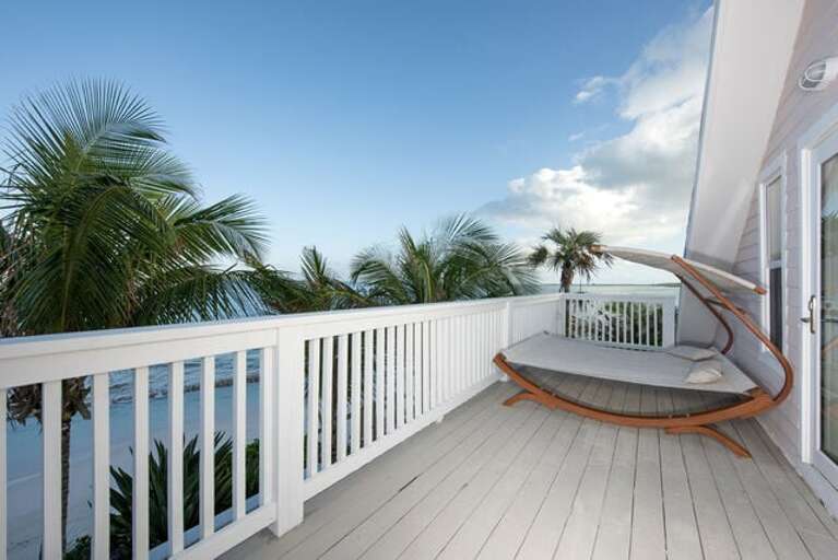 Deck with outdoor seating and ocean views.