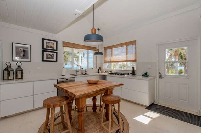 Fully equipped Kitchen with additional seating.