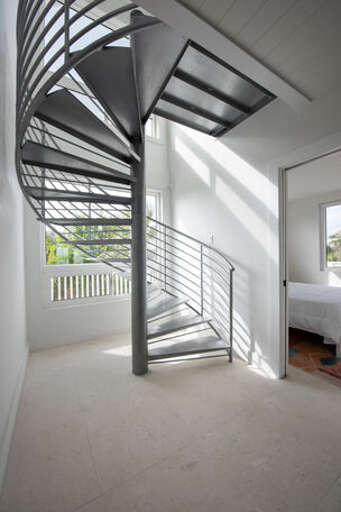 Spiral stairs to upper floor.