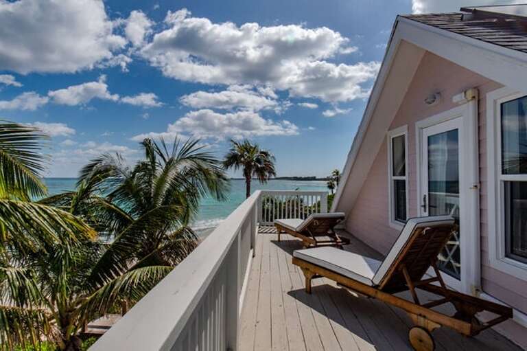 Top floor balcony deck and lounge chairs.