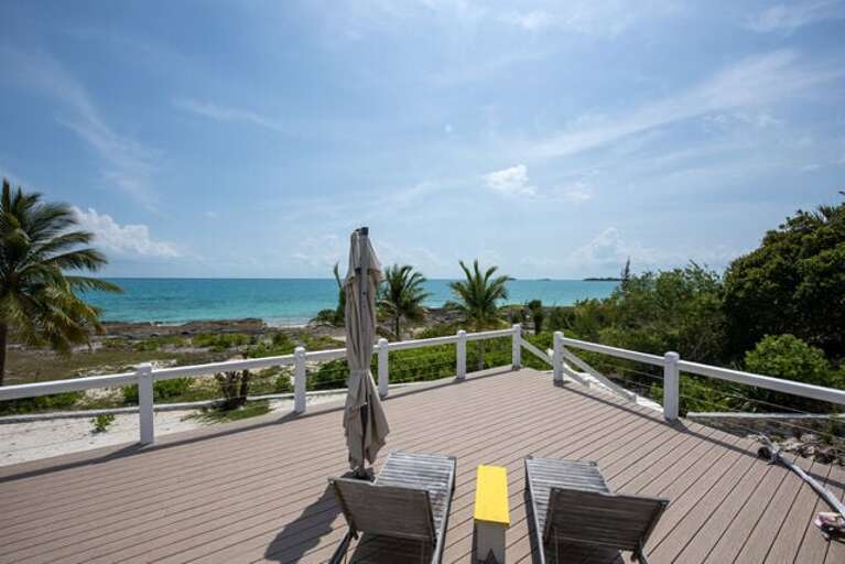 The deck will take you to the walk path to the coral beach front 40' away