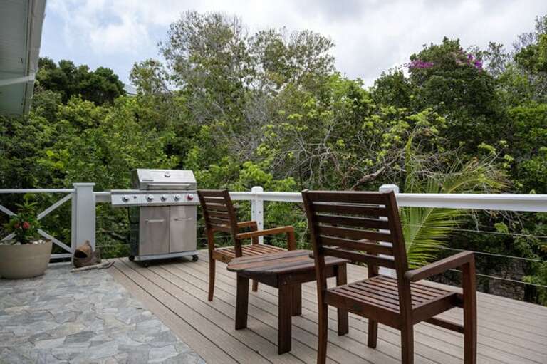 Front deck with gas grill.