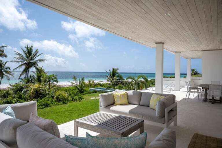 Welcome to Coralli, a private beachfront estate on world-famous Windermere Beach. Welcome to Coralli, a private beachfront estate on world-famous Windermere Beach.