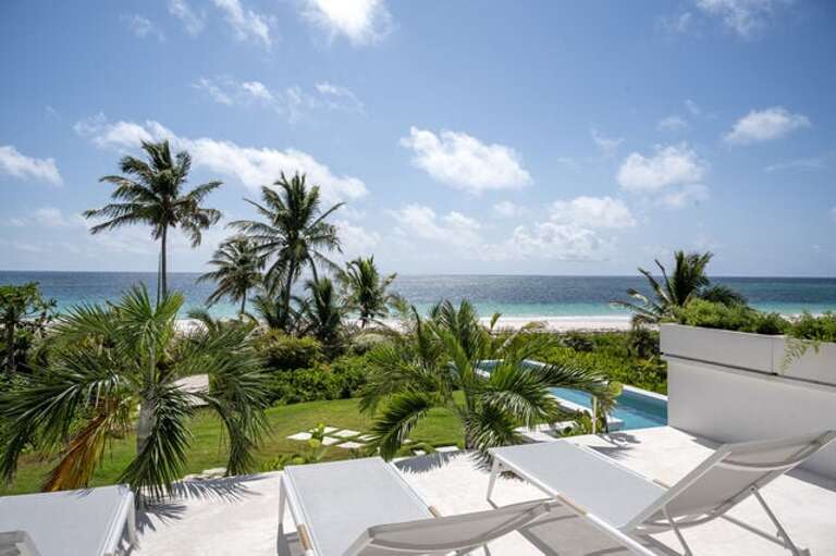Open deck with lounge chair seating.