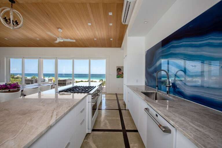 State-of-the art kitchen finished in granite and stainless steel.