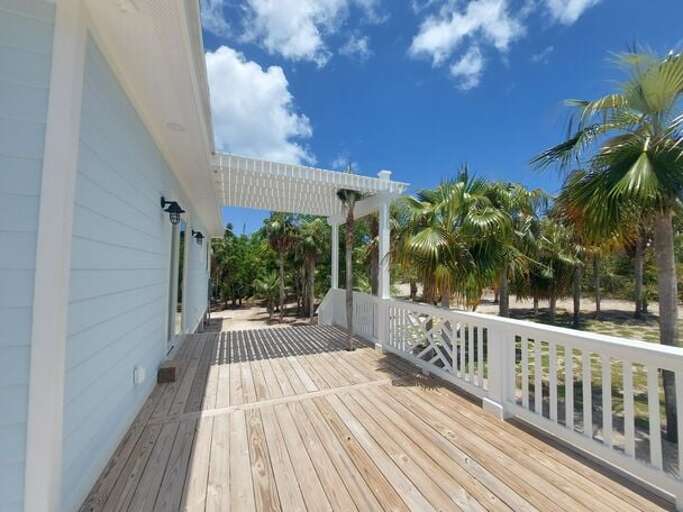 Our broad wrap-around veranda with areas for sunning and shaded areas for lounging.