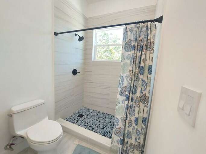 Master bath with walk-in shower.