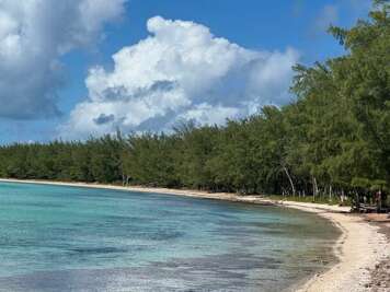 Tranquility Bay Beach on the Caribbean, a 3 minute walk from the cottage.