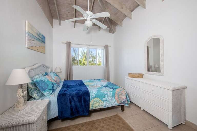 Guest Bedroom Two with queen size bed.