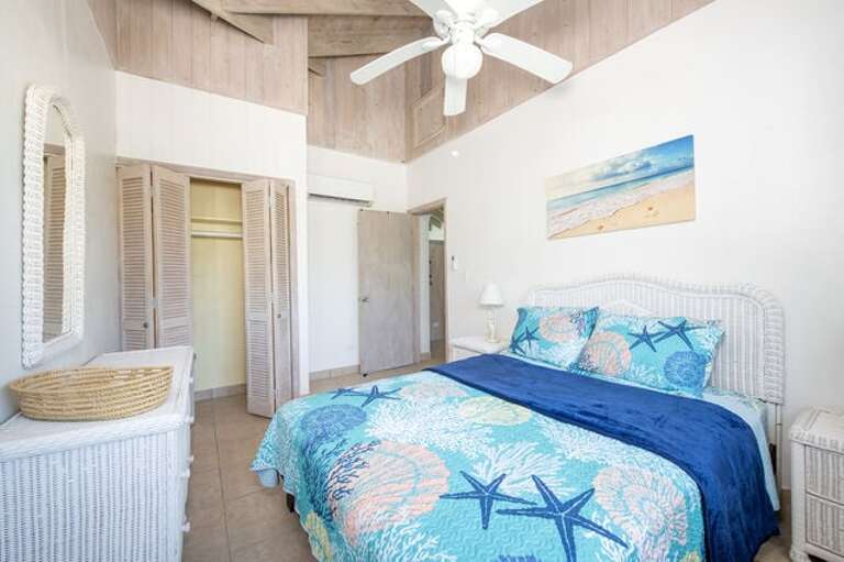 Guest Bedroom Two with queen size bed.