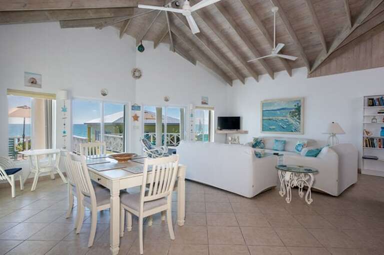 The kitchen opens onto the spacious ocean-view great room.