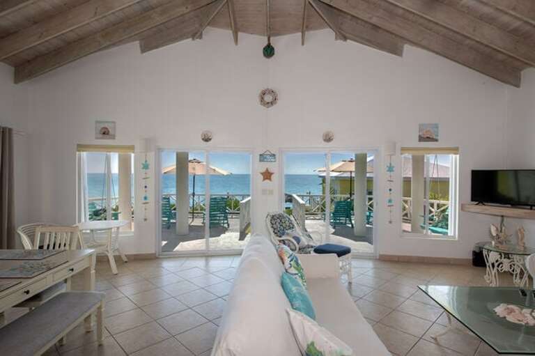 Tranquilville features direct access to the calm turquoise Caribbean.