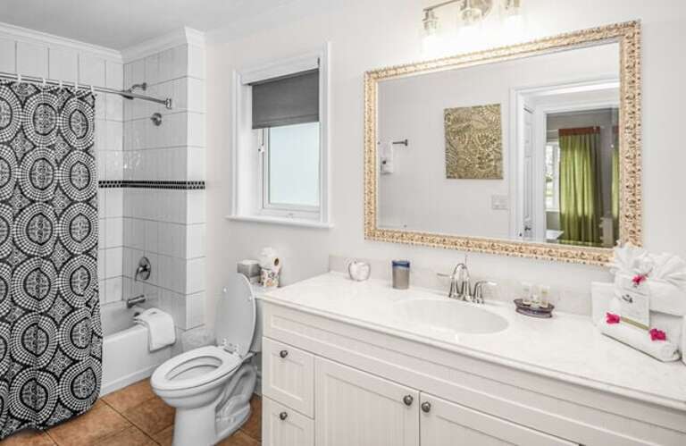 Bath with shower/tub combination.