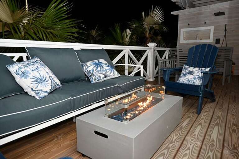 Conversation seating for 5 gathered around the firepit.