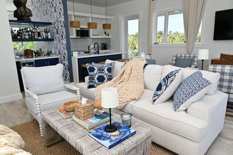 Stylish Seating, Patterned Pillows, Open Kitchen, Tranquil Textures
