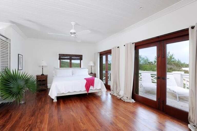 One of two upstairs master bedroom suites with en suite bath and ocean views.