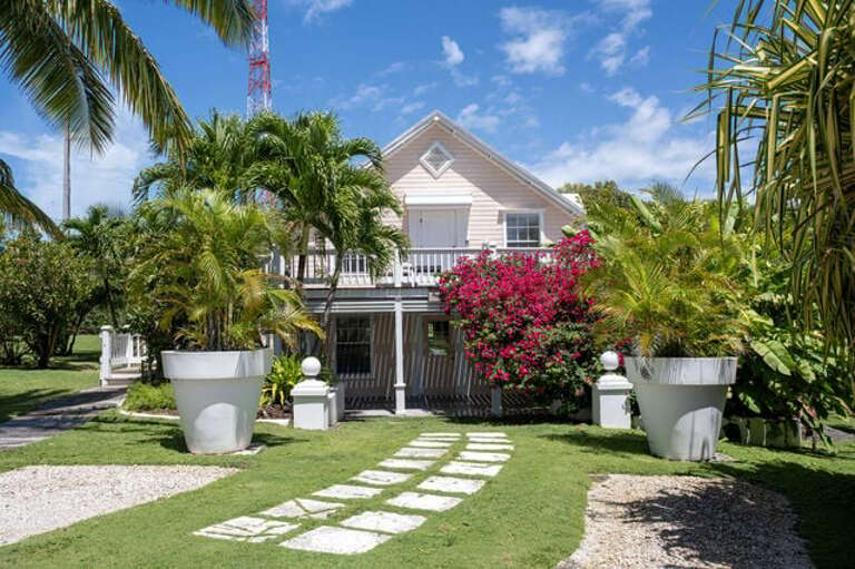 Landscaped grounds designed and decorated by the island's premier designer.