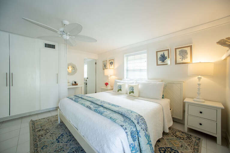 The spacious master bedroom, which also has a door to the patio, has a king bed and an en suite ful bath with a walk-in shower.