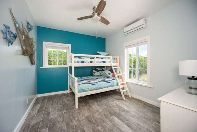 The third bedroom features a twin-over-full bunk bed that comfortably sleeps multiple guests.
