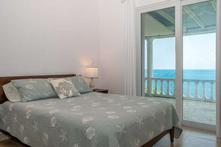 Bedroom Two with queen size bed and an ensuite full bath.