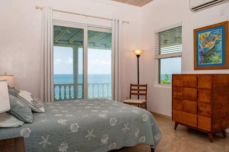 Ocean views and access to veranda from Bedroom Two.