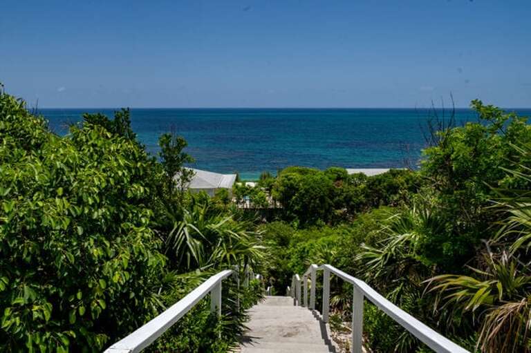 Walk down our private stairway to the Old Banks Road, and from there it's a 100-yard walk to Turtle Beach, which you will almost always have entirely to yourself.