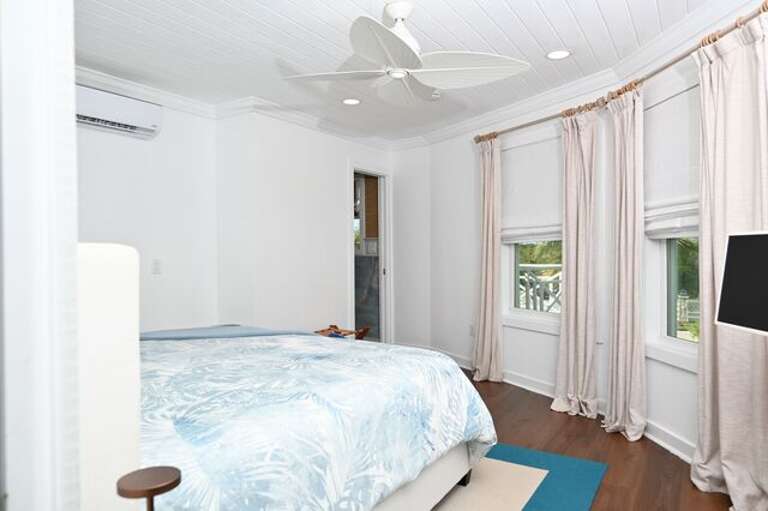 Bedroom One overlooks our beautiful, lush garden featuring coconut, guava, mango, avocado, and banana trees.