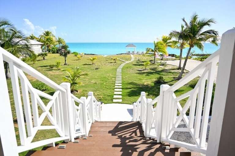 Stairs to beautiful blue Caribbean Ocean.
