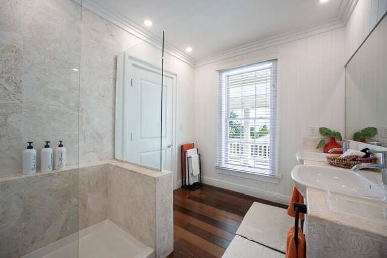 Second master en-suite bath with walk-in shower.