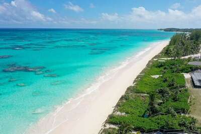 Poponi Beach, a mile-long stretch of pink sand and turquoise water.