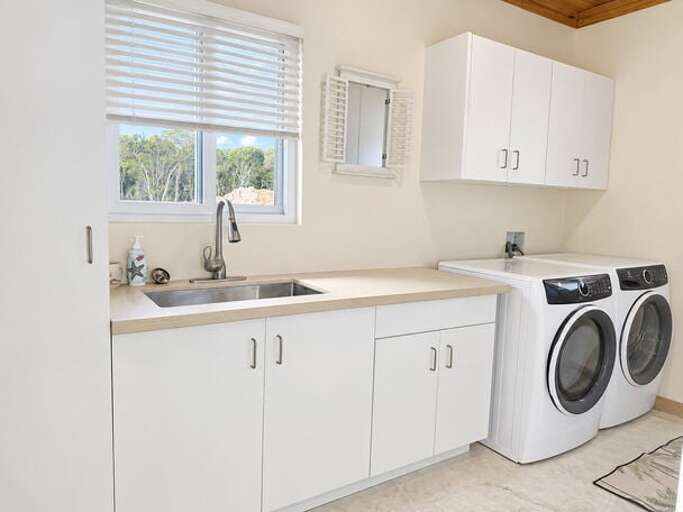 Laundry room with washer and dryer.