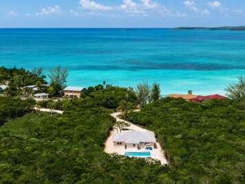 Blue Lagoon House with Ten Bay Beach in the background.