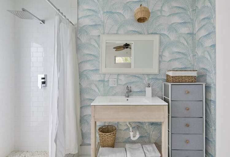 Bath with walk-in shower.