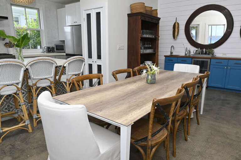Dining table with ocean views and seating for up to 10.