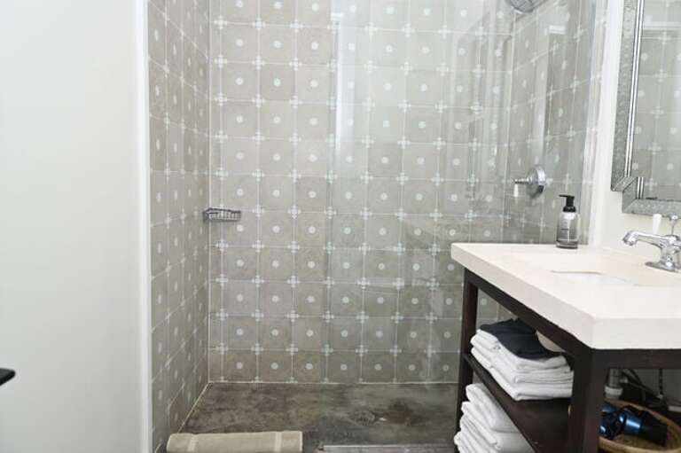 First master bath with walk in shower.