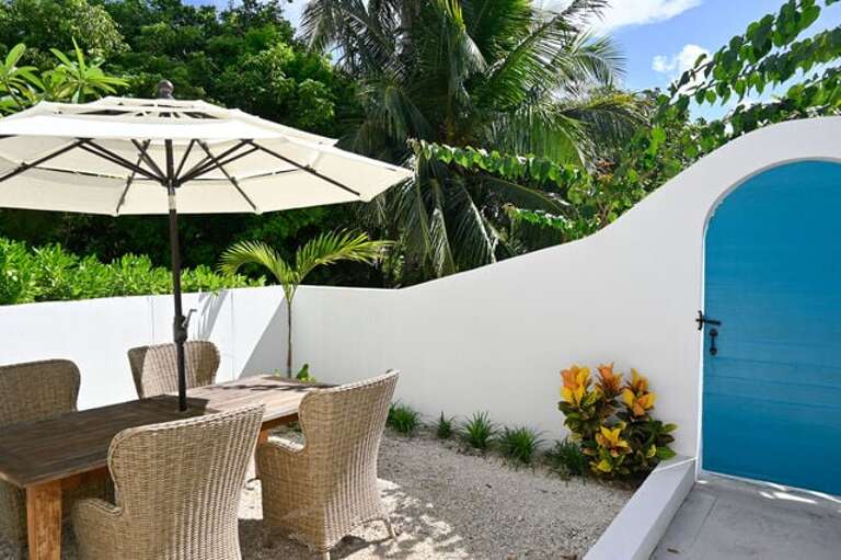 Another outdoor dining area near the entrance to the estate.
