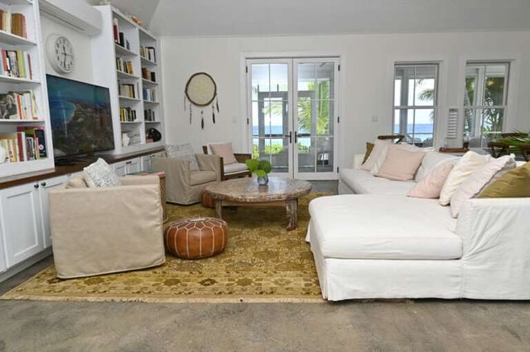 Spacious open-plan great room with a wall of ocean views.