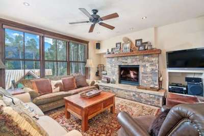 Living Room Features a Gas Fireplace and Flat Screen TV