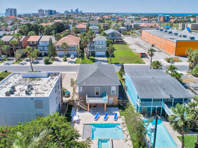 Aerial view of the back of the home featuring the private pool and hot tub! Great backyard! Aerial view of the back of the home featuring the private pool and hot tub! Great backyard!