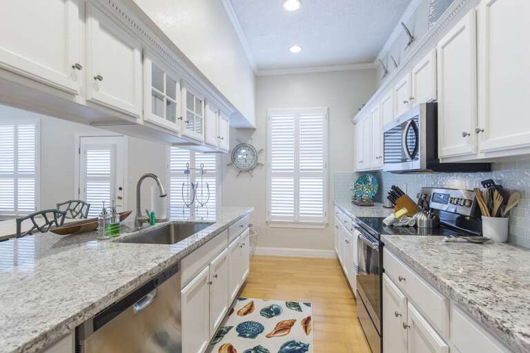 This gorgeous kitchen is fully stocked with all necessary cooking supplies! This gorgeous kitchen is fully stocked with all necessary cooking supplies!
