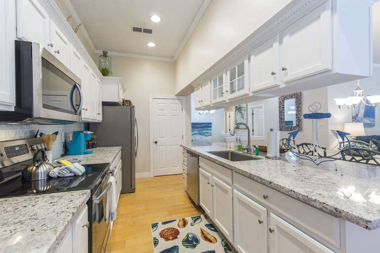 This gorgeous kitchen is fully stocked with all necessary cooking supplies! This gorgeous kitchen is fully stocked with all necessary cooking supplies!