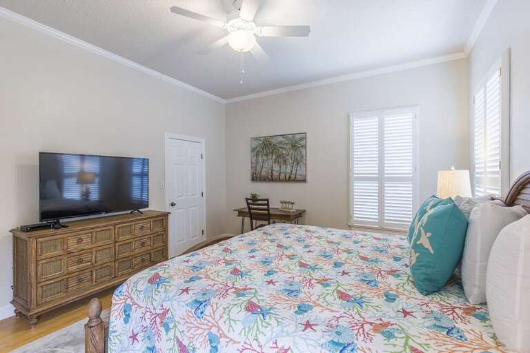 Large spacious master bedroom with a king bed and flat screen TV located on the second floor!