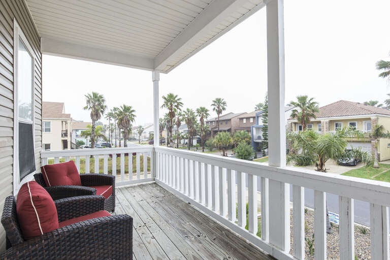 Peaceful balcony facing the front of the home. Peaceful balcony facing the front of the home.