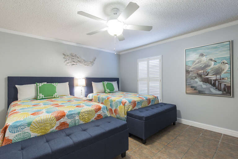Wonderful guest bedroom with 2 queen beds located on the first floor!