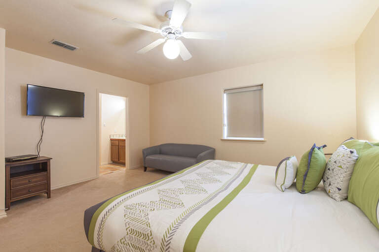 5th bedroom has a single King size bed and an attached bathroom 5th bedroom has a single King size bed and an attached bathroom