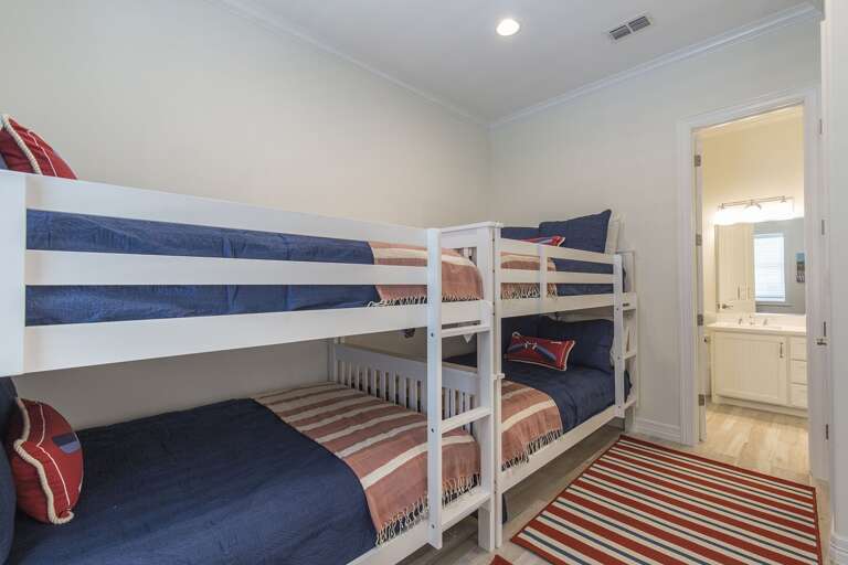 Guest bedroom with full size bunk beds located downstairs!