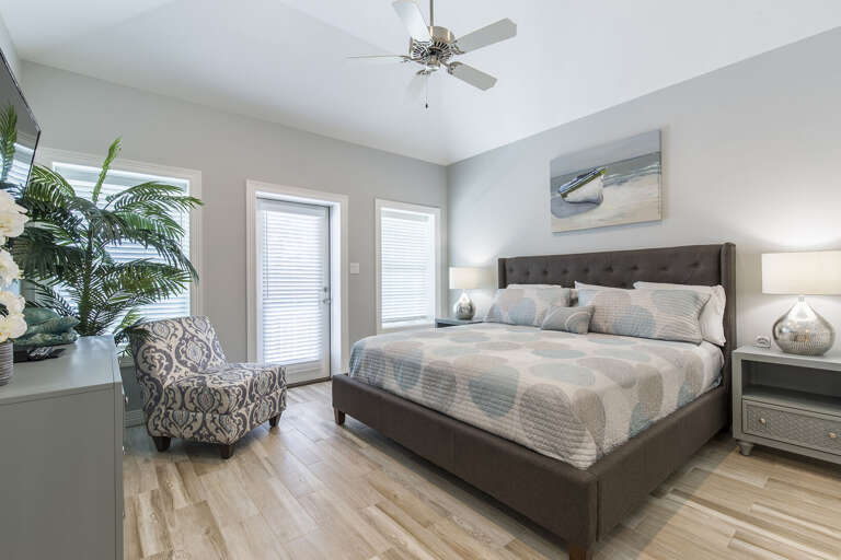 Guest bedroom with king bed located upstairs!